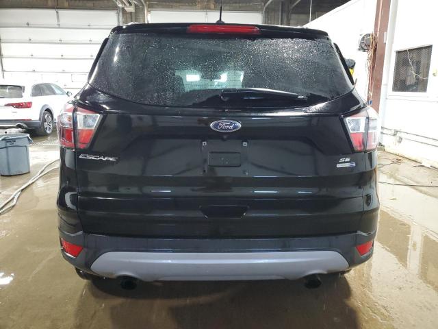 Photo 5 VIN: 1FMCU9GDXJUC11193 - FORD ESCAPE SE 