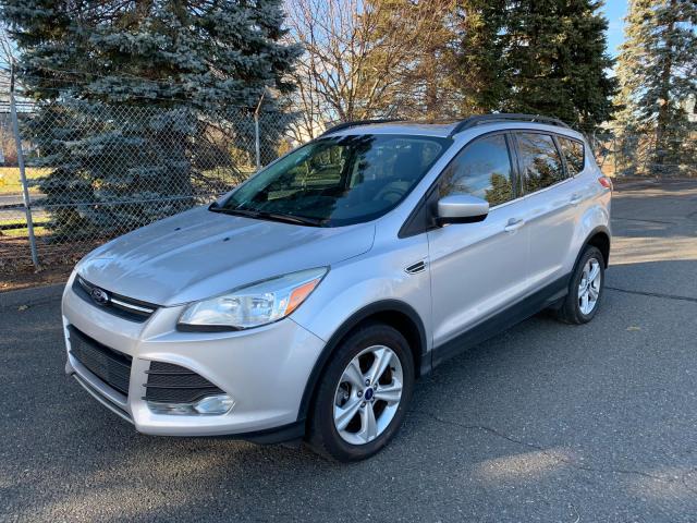 Photo 1 VIN: 1FMCU9GX0EUB04136 - FORD ESCAPE SE 