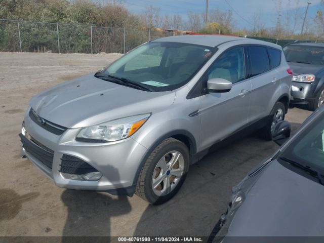 Photo 1 VIN: 1FMCU9GX0GUB75601 - FORD ESCAPE 