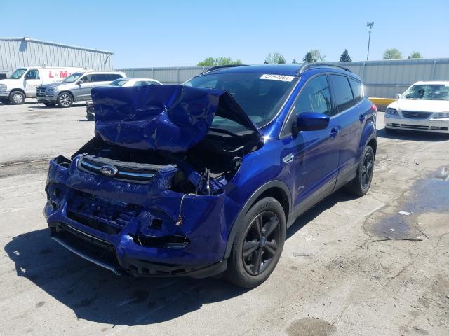 Photo 1 VIN: 1FMCU9GX0GUB91443 - FORD ESCAPE SE 