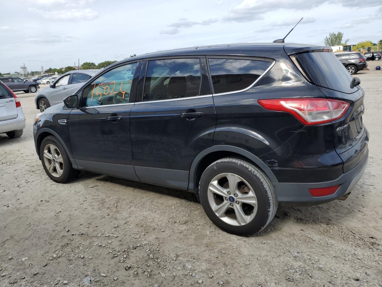 Photo 1 VIN: 1FMCU9GX0GUC13487 - FORD ESCAPE 