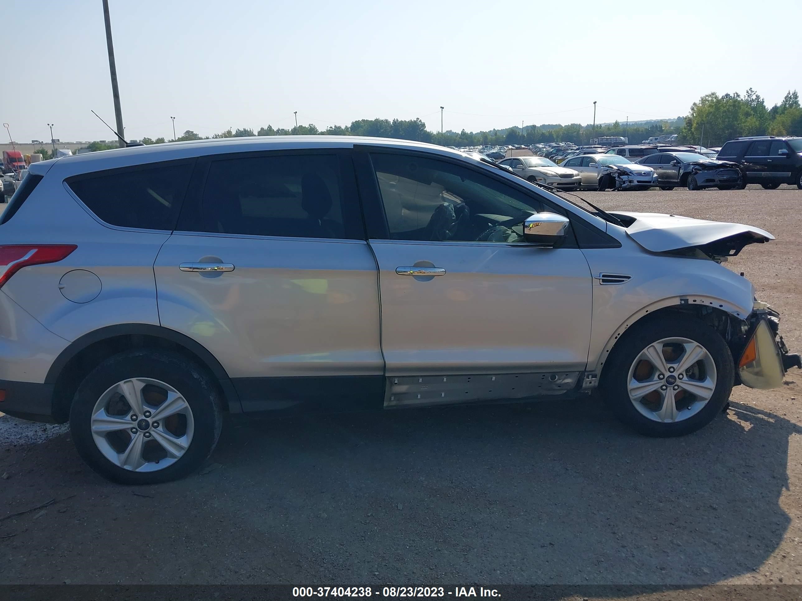 Photo 11 VIN: 1FMCU9GX1EUC10207 - FORD ESCAPE 