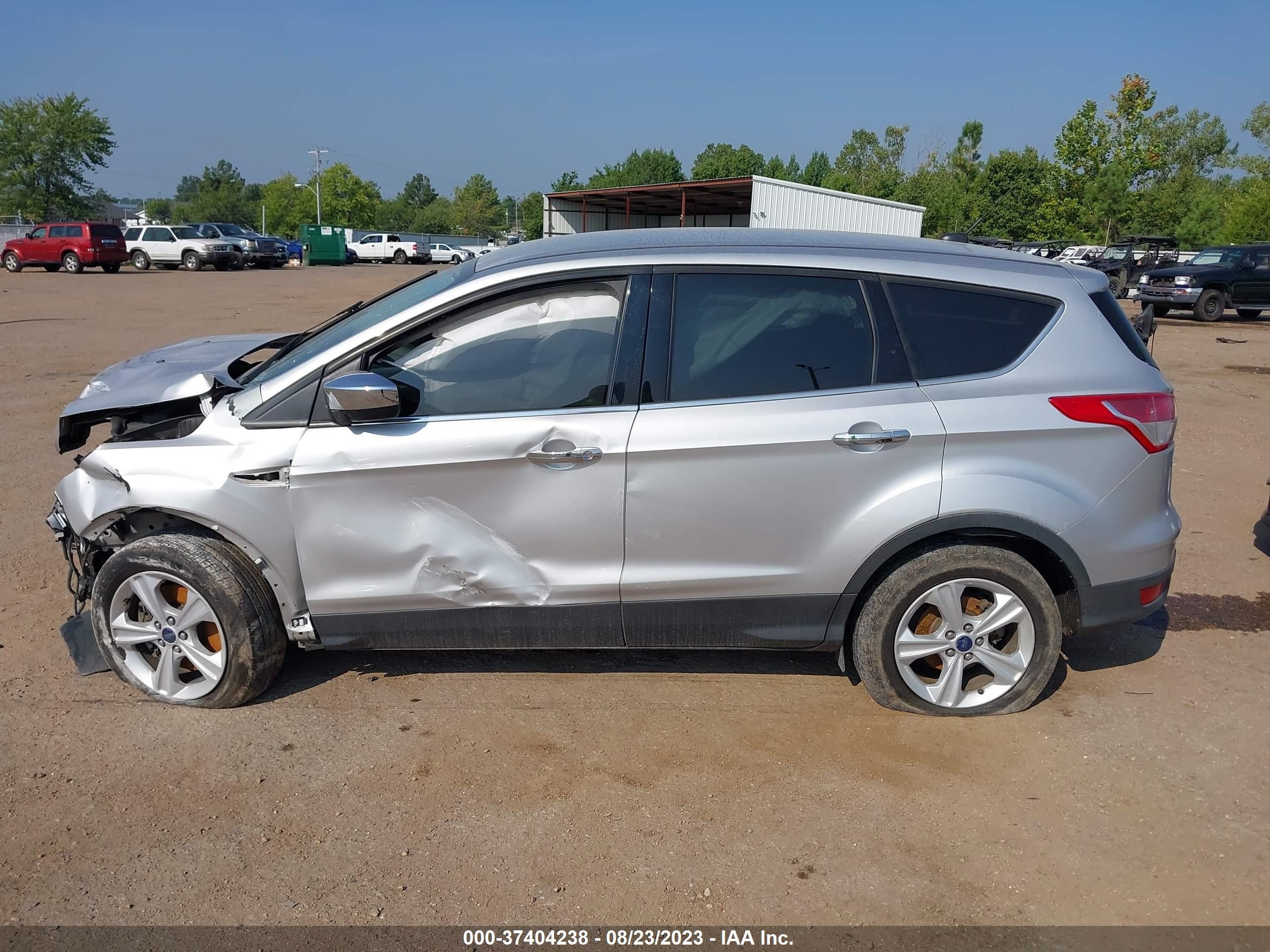 Photo 12 VIN: 1FMCU9GX1EUC10207 - FORD ESCAPE 