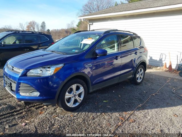 Photo 1 VIN: 1FMCU9GX1GUA89908 - FORD ESCAPE 