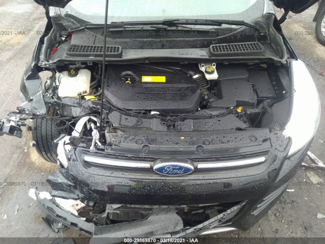 Photo 9 VIN: 1FMCU9GX1GUB42123 - FORD ESCAPE 