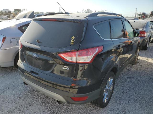 Photo 3 VIN: 1FMCU9GX2GUA51572 - FORD ESCAPE SE 