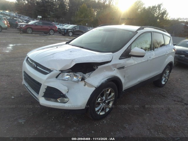 Photo 1 VIN: 1FMCU9GX2GUB83036 - FORD ESCAPE 