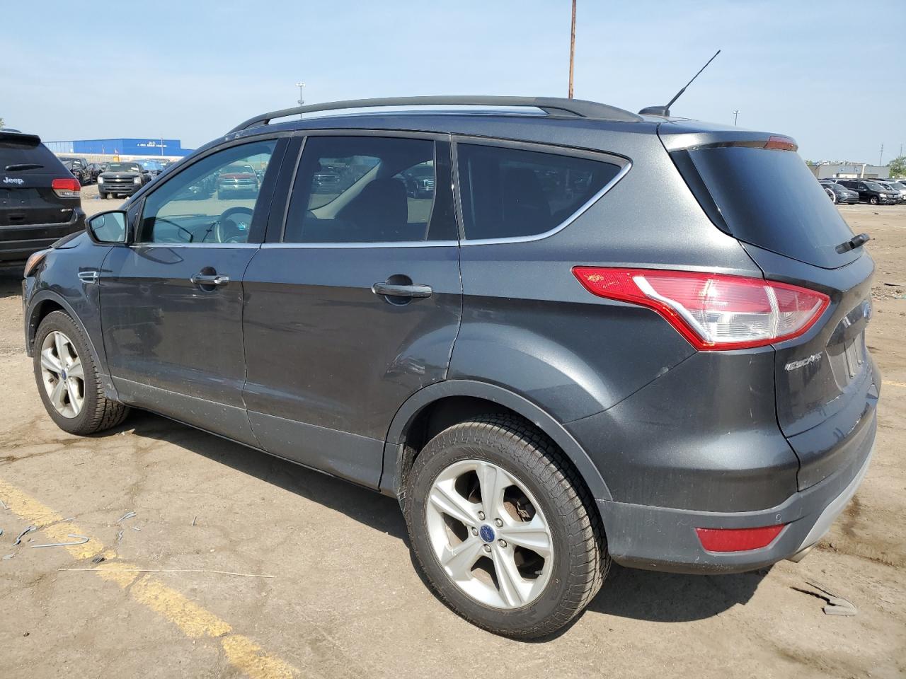 Photo 1 VIN: 1FMCU9GX2GUC56874 - FORD ESCAPE 