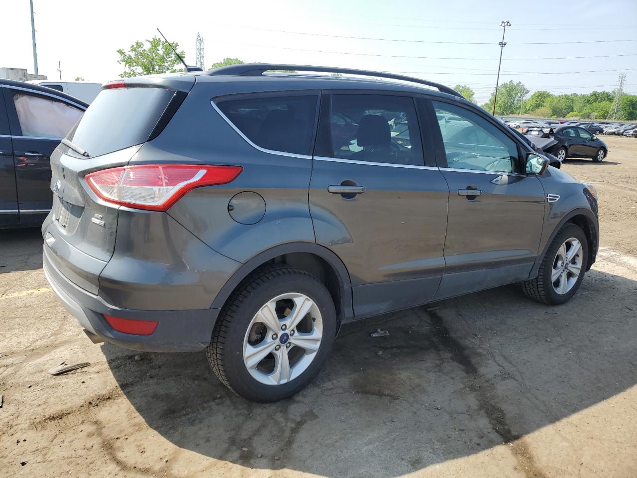 Photo 2 VIN: 1FMCU9GX2GUC56874 - FORD ESCAPE 