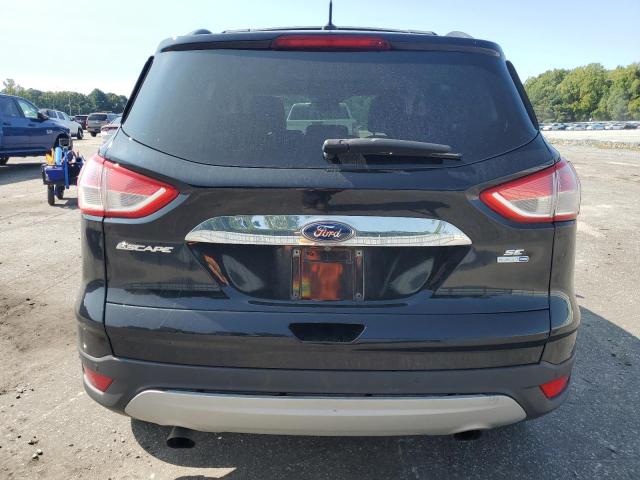 Photo 5 VIN: 1FMCU9GX3GUB03033 - FORD ESCAPE SE 