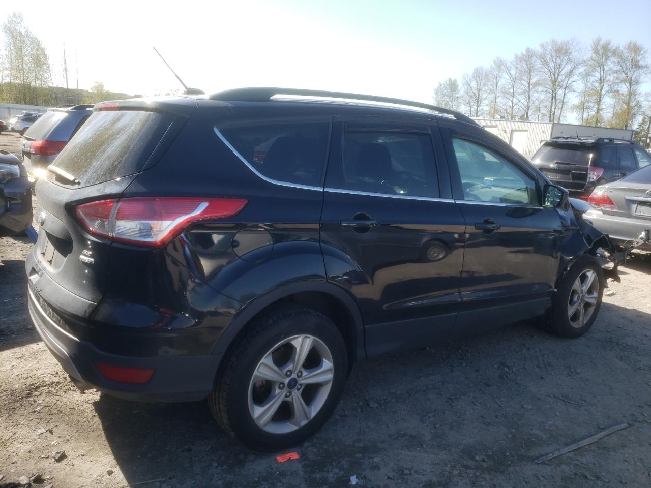 Photo 2 VIN: 1FMCU9GX3GUB08362 - FORD ESCAPE 