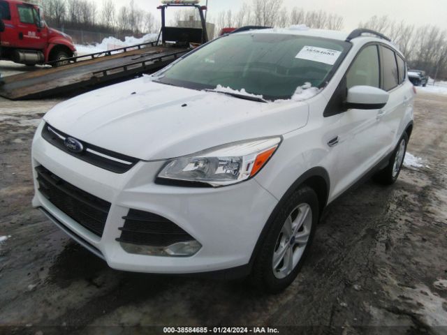 Photo 1 VIN: 1FMCU9GX3GUB91467 - FORD ESCAPE 