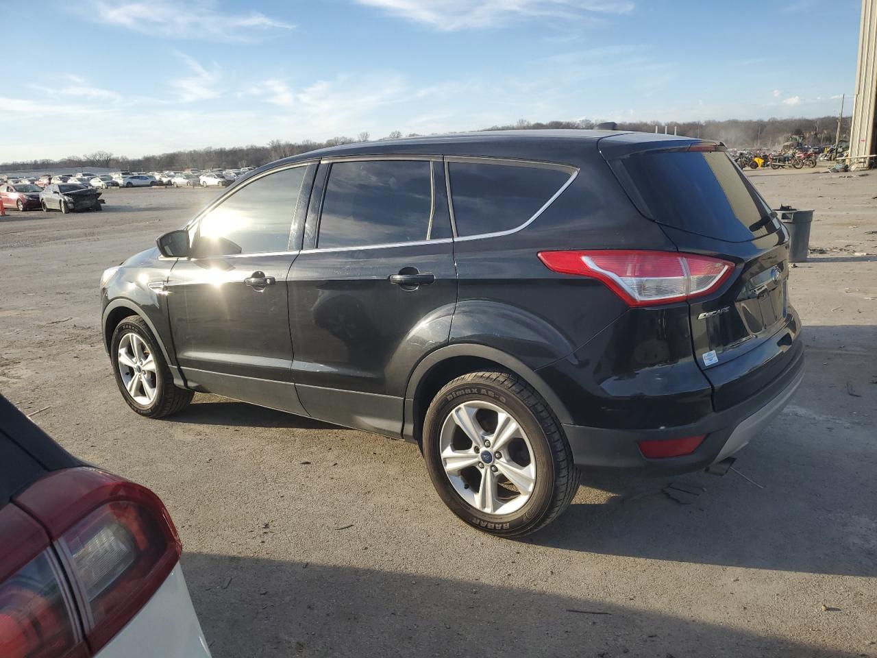 Photo 1 VIN: 1FMCU9GX4FUC75991 - FORD ESCAPE 