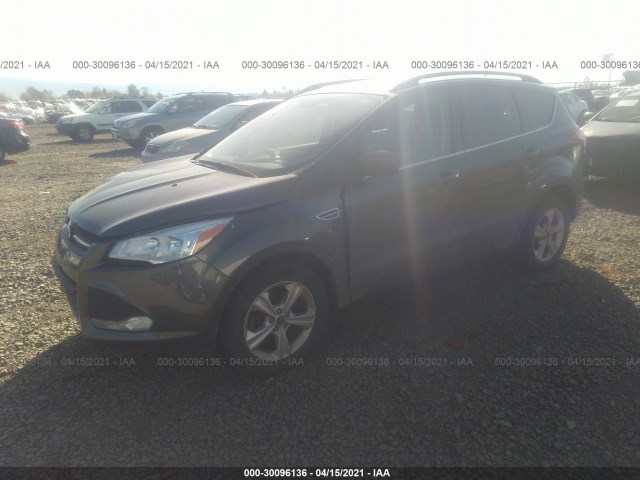 Photo 1 VIN: 1FMCU9GX4GUB00089 - FORD ESCAPE 