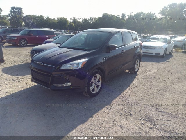 Photo 1 VIN: 1FMCU9GX4GUB27874 - FORD ESCAPE 