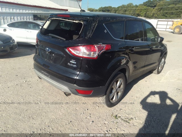 Photo 5 VIN: 1FMCU9GX4GUB27874 - FORD ESCAPE 