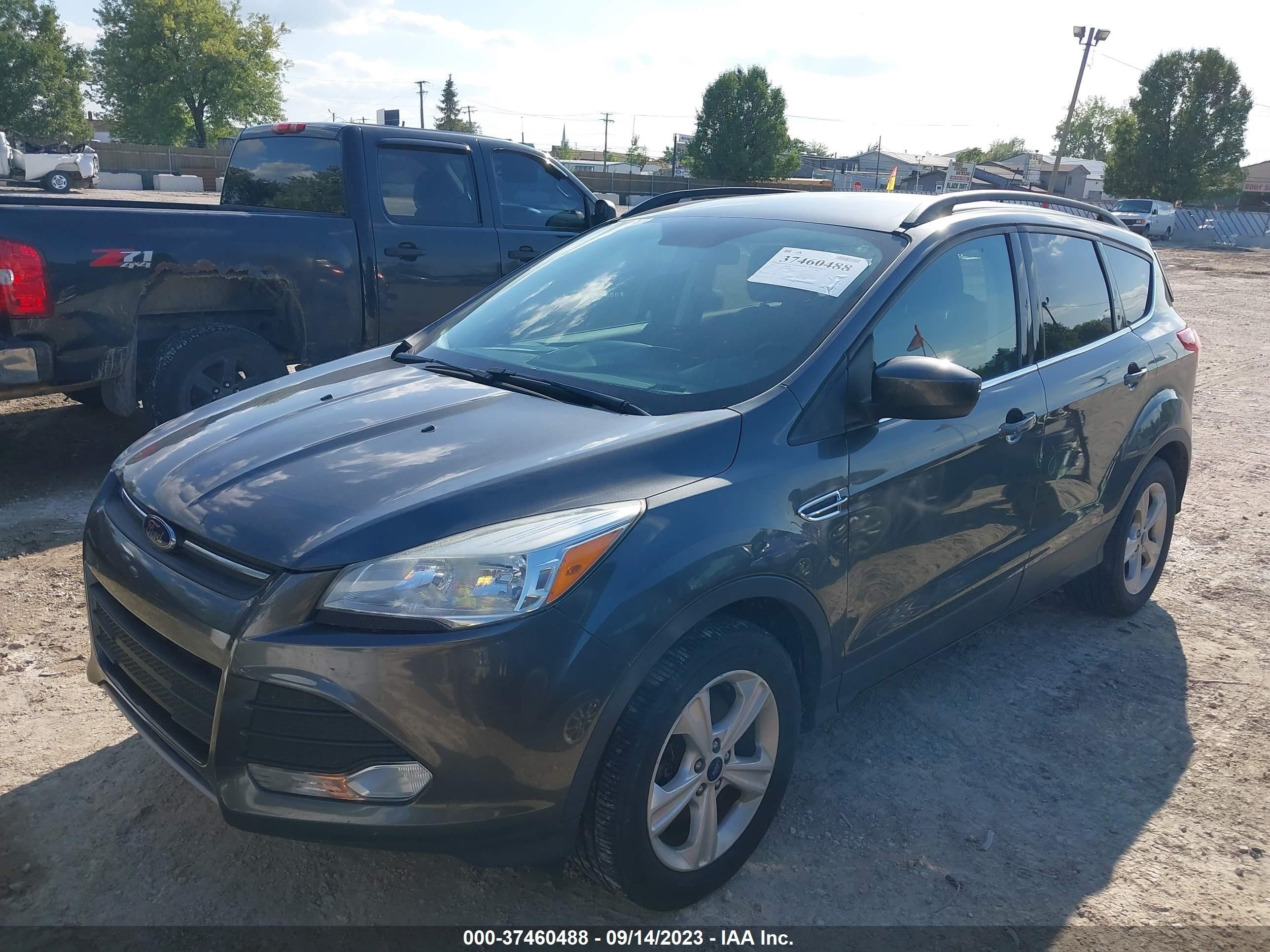 Photo 1 VIN: 1FMCU9GX4GUB69168 - FORD ESCAPE 