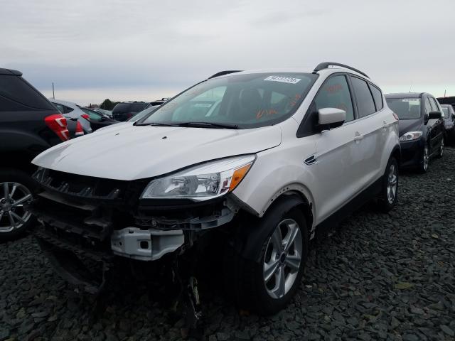 Photo 1 VIN: 1FMCU9GX4GUB81823 - FORD ESCAPE 