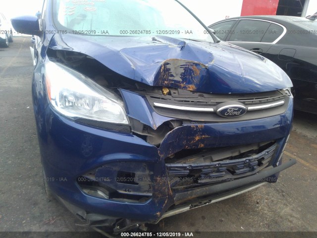 Photo 5 VIN: 1FMCU9GX5EUE53910 - FORD ESCAPE 