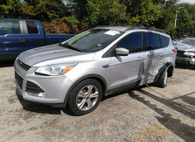 Photo 1 VIN: 1FMCU9GX5GUB02711 - FORD ESCAPE 