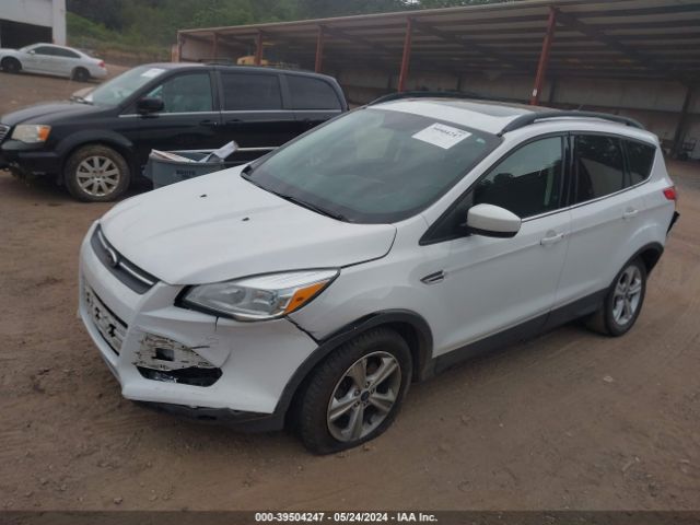 Photo 1 VIN: 1FMCU9GX5GUB45848 - FORD ESCAPE 