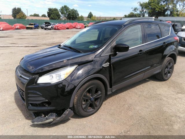 Photo 1 VIN: 1FMCU9GX6GUB33014 - FORD ESCAPE 