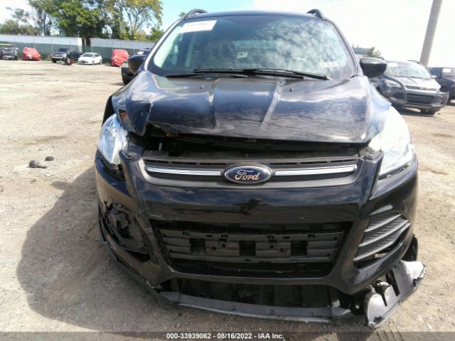 Photo 5 VIN: 1FMCU9GX6GUB33014 - FORD ESCAPE 