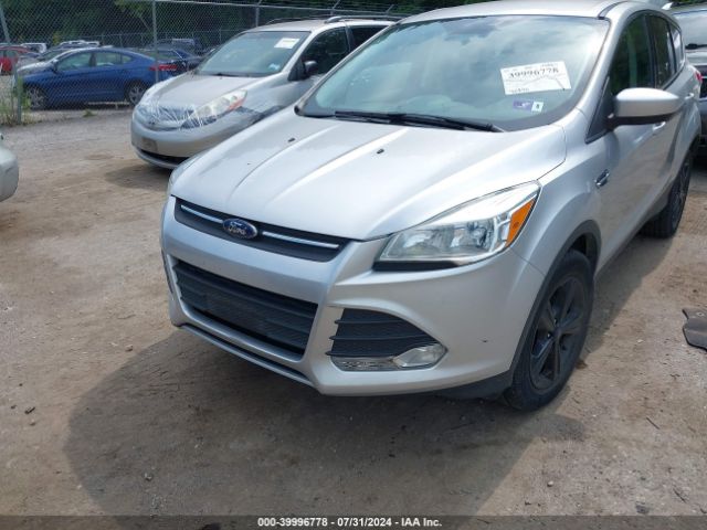 Photo 1 VIN: 1FMCU9GX6GUB65770 - FORD ESCAPE 