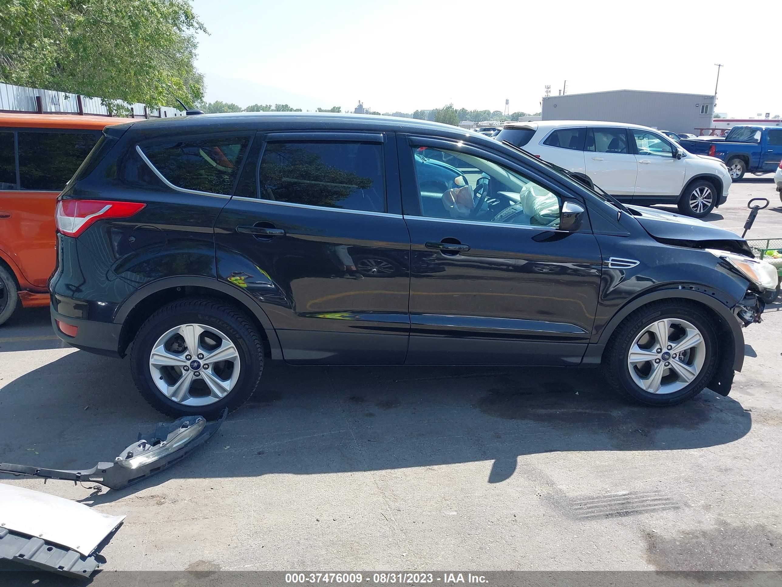 Photo 12 VIN: 1FMCU9GX7EUA03031 - FORD ESCAPE 