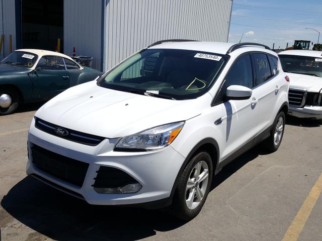 Photo 1 VIN: 1FMCU9GX7GUA84633 - FORD ESCAPE 