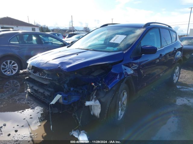 Photo 1 VIN: 1FMCU9GX7GUB44992 - FORD ESCAPE 