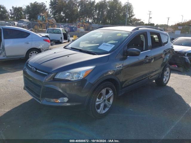 Photo 1 VIN: 1FMCU9GX7GUB63414 - FORD ESCAPE 