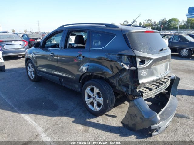 Photo 2 VIN: 1FMCU9GX7GUB63414 - FORD ESCAPE 