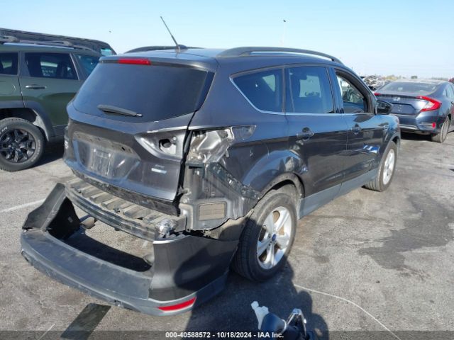 Photo 3 VIN: 1FMCU9GX7GUB63414 - FORD ESCAPE 