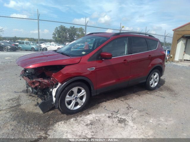 Photo 1 VIN: 1FMCU9GX7GUB69438 - FORD ESCAPE 