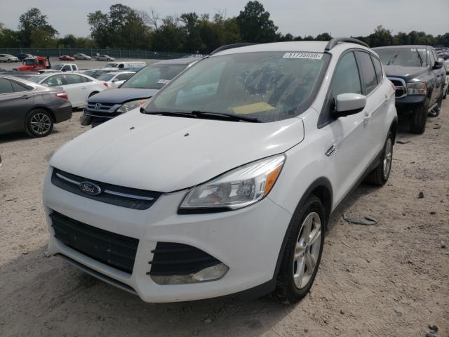 Photo 1 VIN: 1FMCU9GX8GUB63311 - FORD ESCAPE SE 