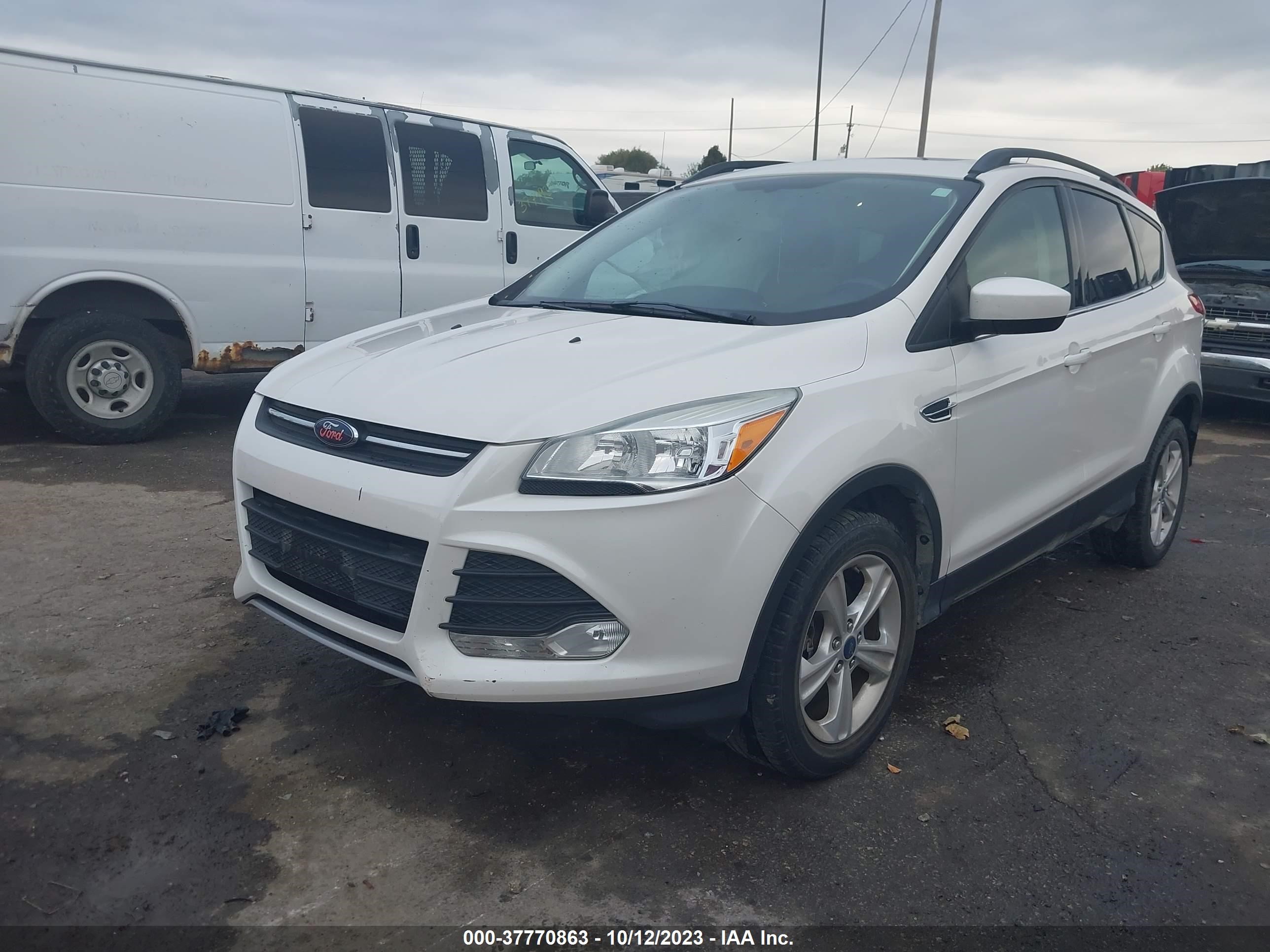 Photo 1 VIN: 1FMCU9GX9EUB45638 - FORD ESCAPE 