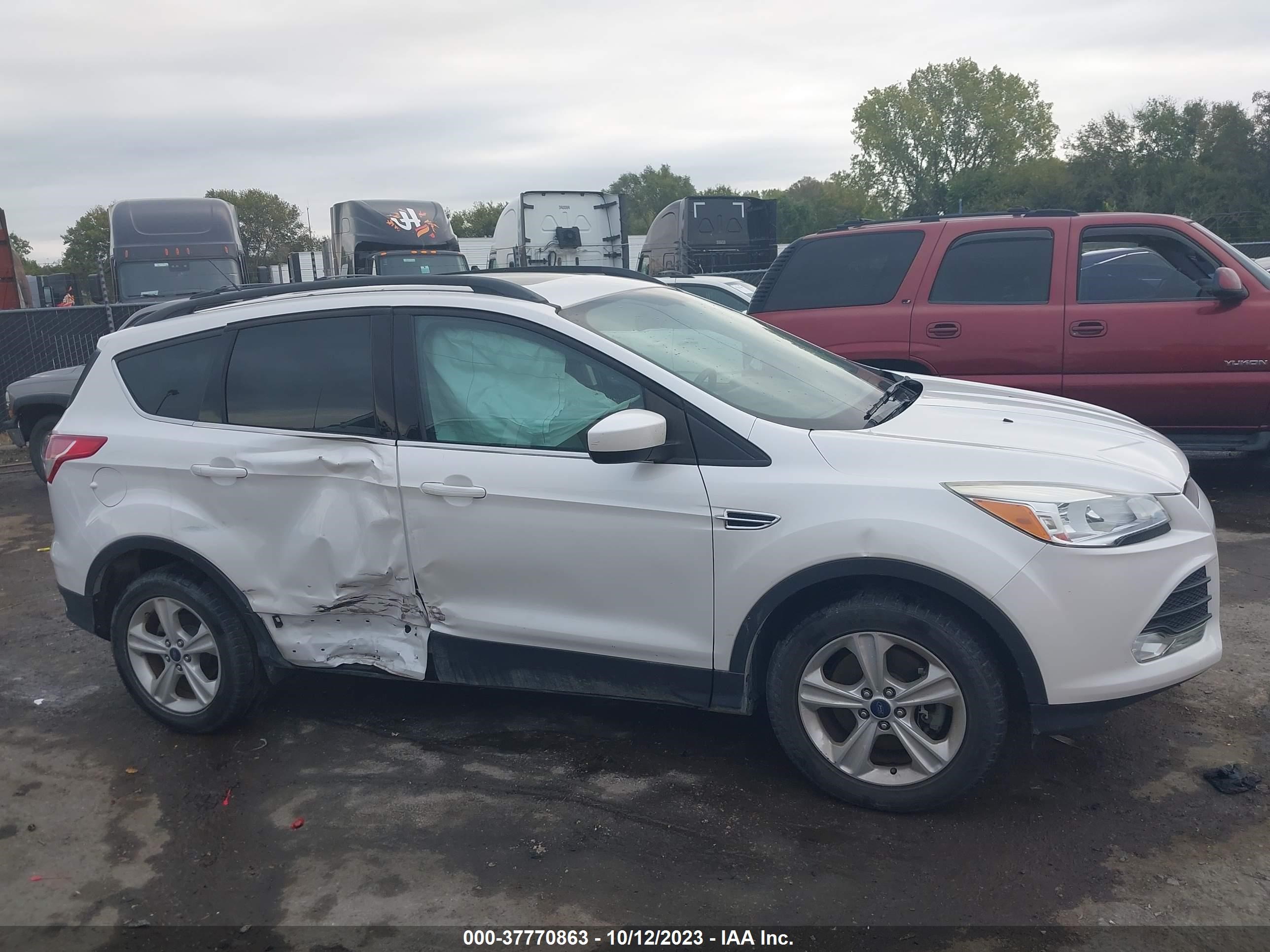 Photo 12 VIN: 1FMCU9GX9EUB45638 - FORD ESCAPE 