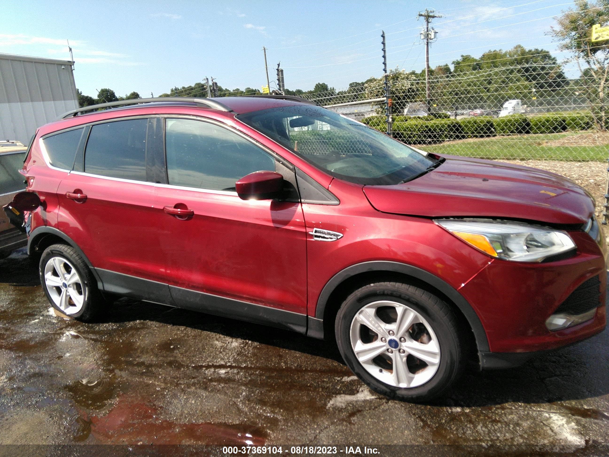 Photo 12 VIN: 1FMCU9GX9GUA89333 - FORD ESCAPE 