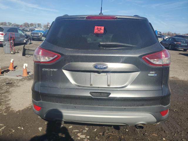 Photo 5 VIN: 1FMCU9GX9GUB28406 - FORD ESCAPE SE 