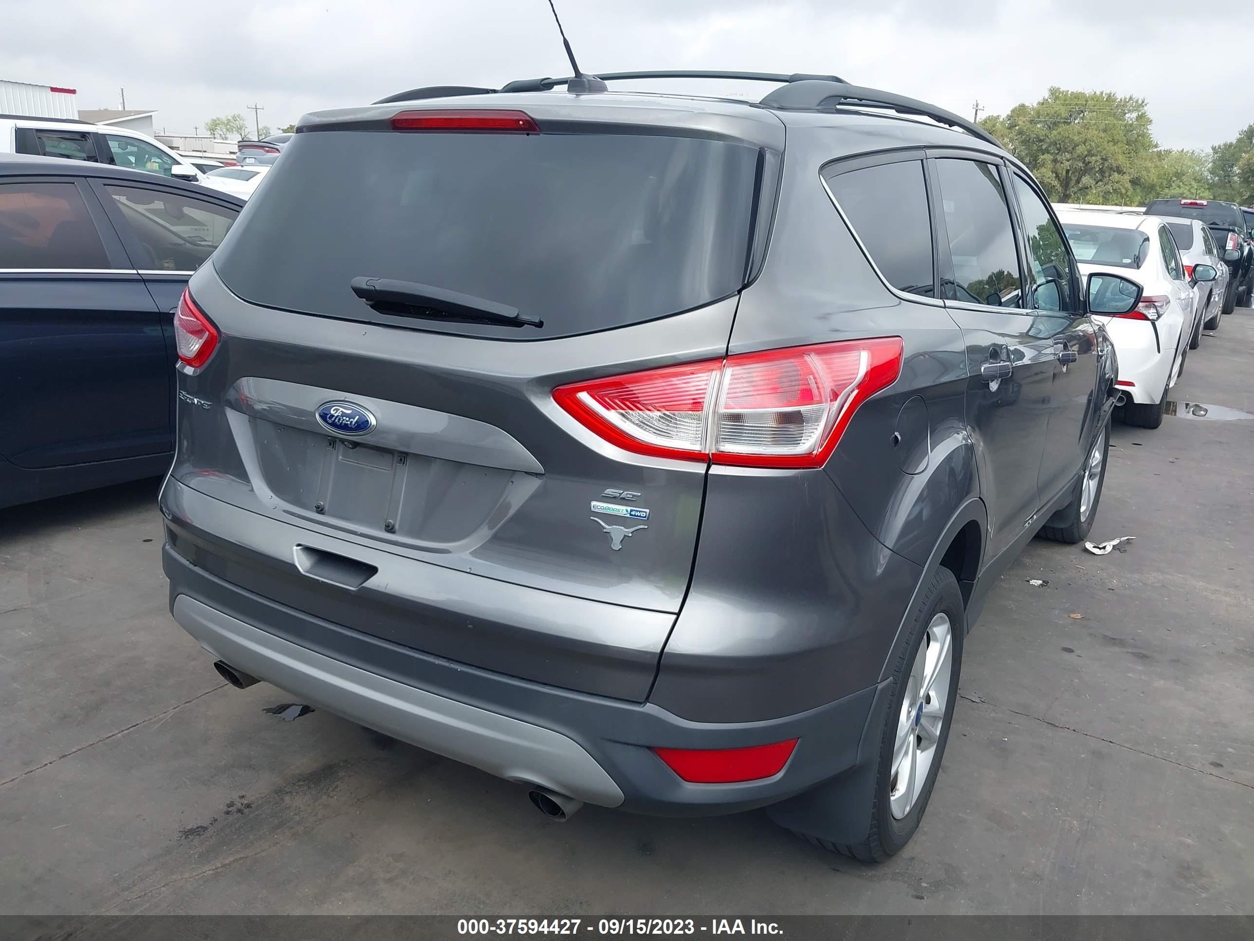 Photo 3 VIN: 1FMCU9GXXEUA77110 - FORD ESCAPE 