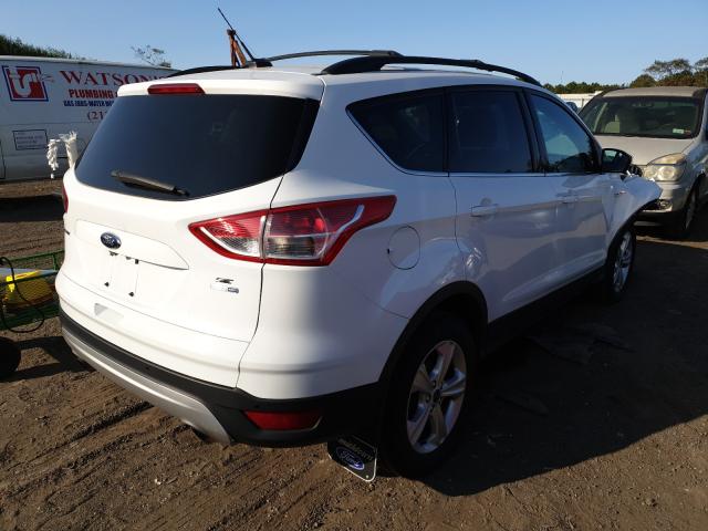 Photo 3 VIN: 1FMCU9GXXEUD76399 - FORD ESCAPE 