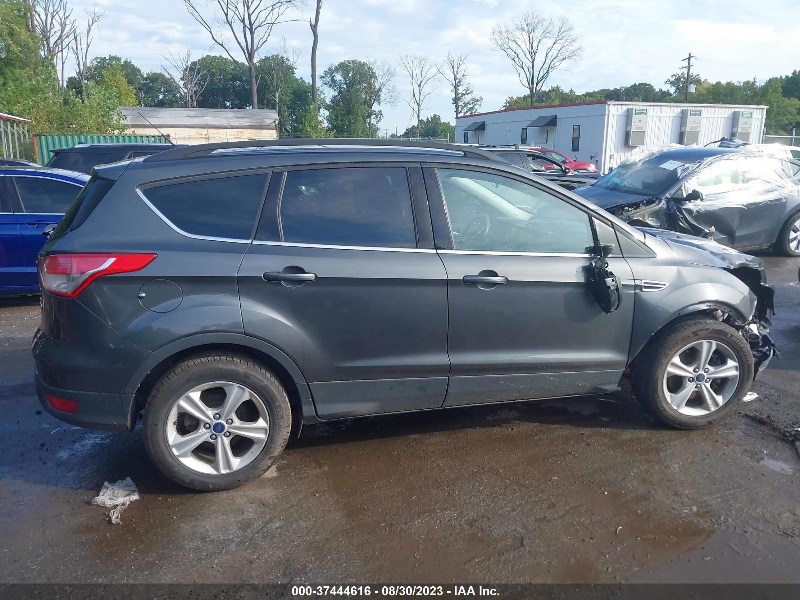 Photo 12 VIN: 1FMCU9GXXGUA05021 - FORD ESCAPE 