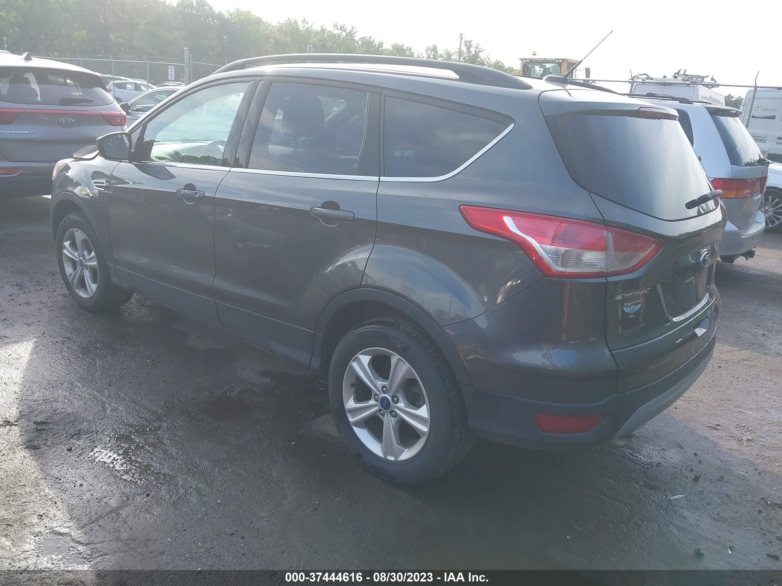 Photo 2 VIN: 1FMCU9GXXGUA05021 - FORD ESCAPE 