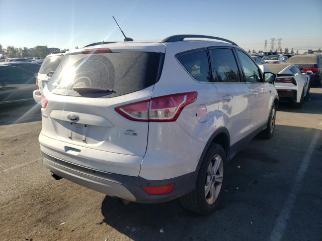 Photo 3 VIN: 1FMCU9GXXGUA55479 - FORD ESCAPE SE 