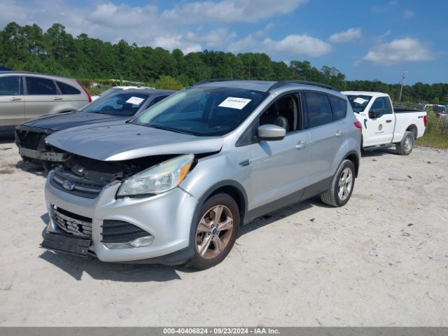 Photo 1 VIN: 1FMCU9GXXGUB02350 - FORD ESCAPE 