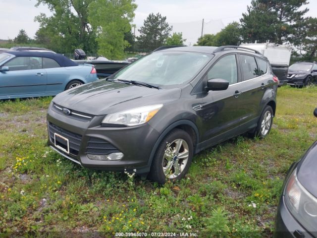 Photo 1 VIN: 1FMCU9GXXGUB02770 - FORD ESCAPE 