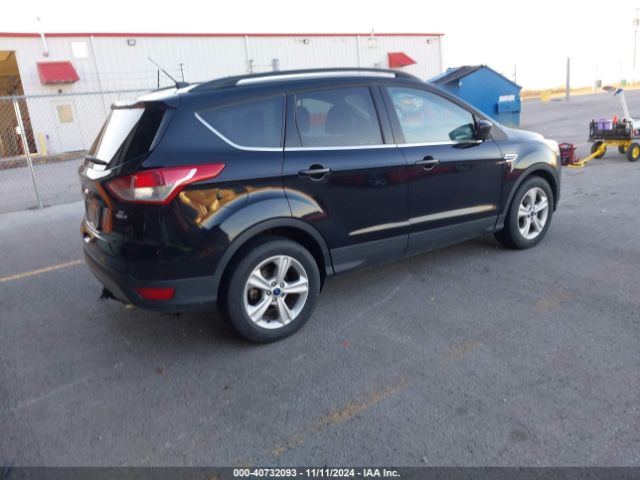 Photo 3 VIN: 1FMCU9GXXGUB92244 - FORD ESCAPE 