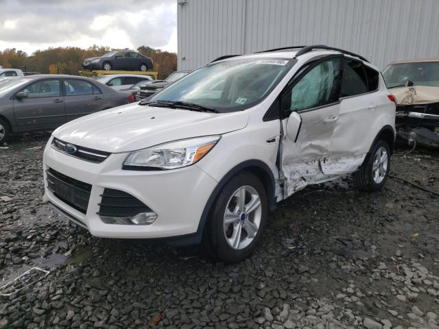 Photo 1 VIN: 1FMCU9GXXGUC74460 - FORD ESCAPE SE 