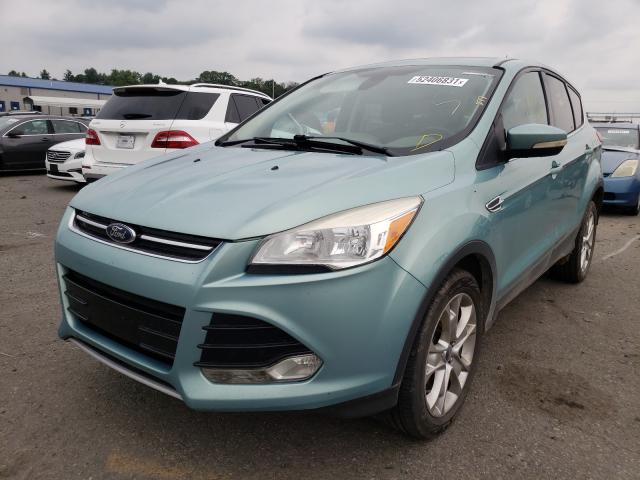 Photo 1 VIN: 1FMCU9H91DUD04277 - FORD ESCAPE SEL 